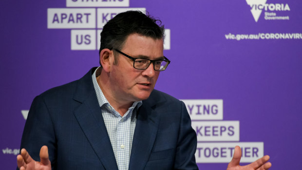 Premier Daniel Andrews addresses the media on Friday.