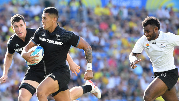 Streaker: Etene Nanai-Seturo breaks free before scoring against Fiji in the final at Robina Stadium.