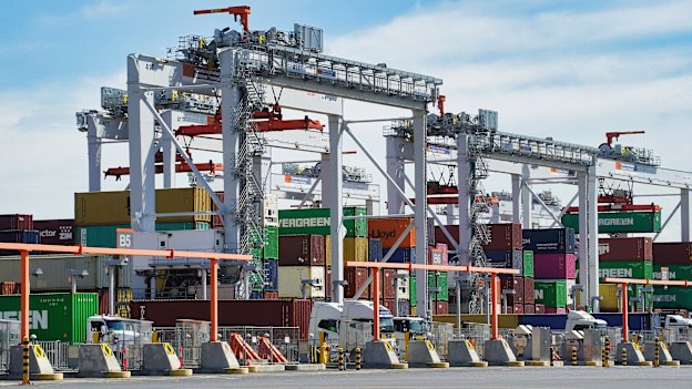 Automated landside cranes manage containers for trucks at Webb Dock.