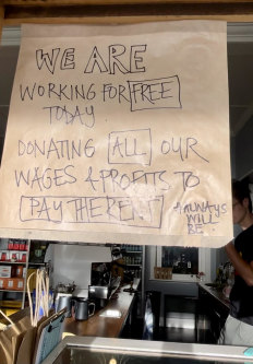 A sign at Brunswick cafe John Gorilla where profits were donated on Australia Day.