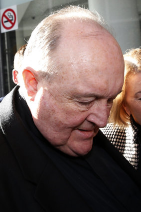 Archbishop Philip Wilson arrives for sentencing at Newcastle Local Court.