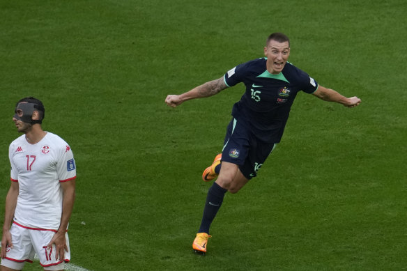 Mitchell Duke celebrates after scoring against Tunisia at the 2022 World Cup.