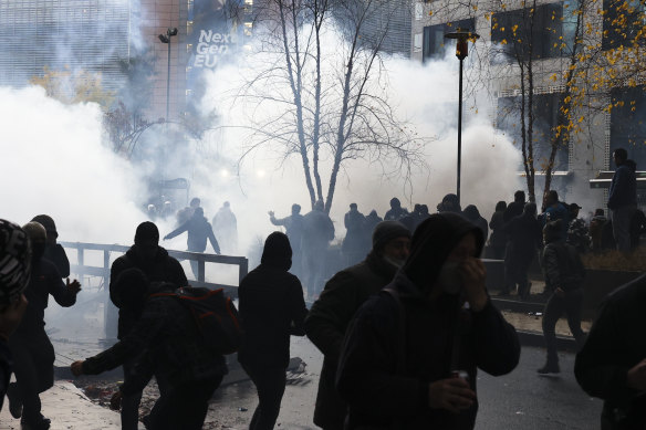 Protesters clash with riot police in Belgium.