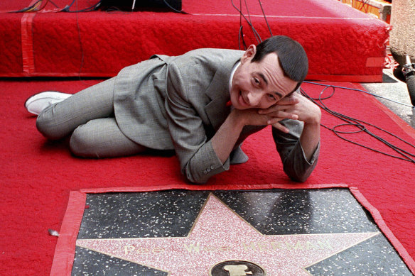 Pee wee Herman admires his star on the Walk of Fame in Hollywood in 1988.