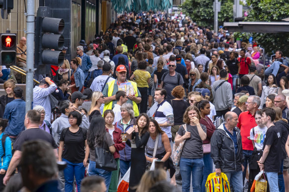 A very different picture: Shoppers pictured in Melbourne's CBD during last year's Christmas shopping rush.