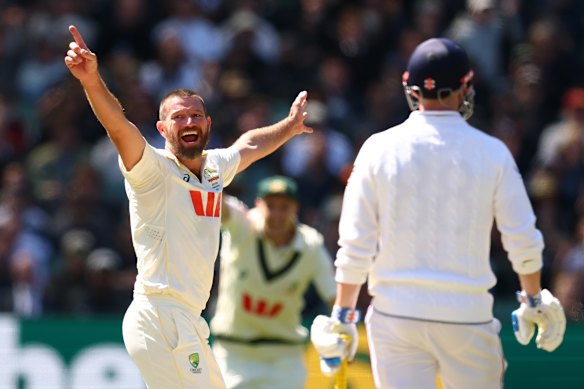 Michael Neser celebrates Joe Root’s wicket at the MCG on Boxing Day.