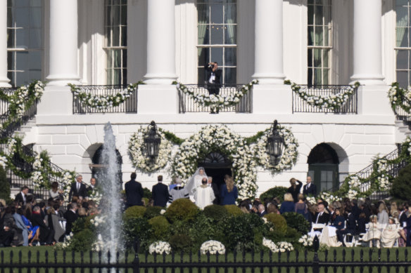 President Joe Biden’s granddaughter Naomi Biden and her fiance, Peter Neal, are married on the South Lawn of the White House in Washington on Saturday.