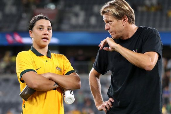 Tony Gustavsson speaks with skipper Sam Kerr after the game.