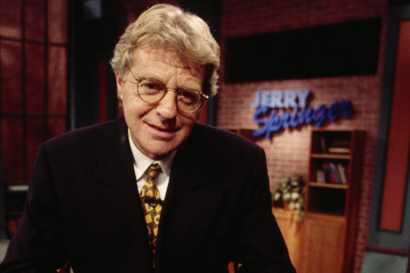 Talk show host Jerry Springer sits on the set of his TV program The Jerry Springer Show