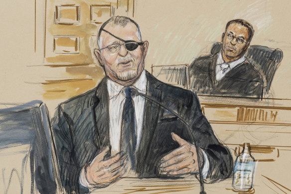 This artist sketch depicts the trial of Oath Keepers leader Stewart Rhodes, left.