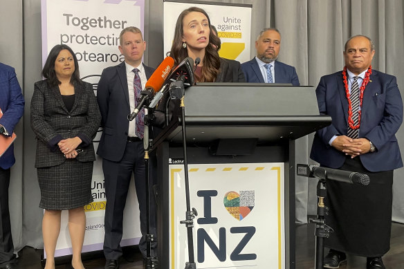 New Zealand Prime Minister Jacinda Ardern announces plans to reopen borders to the world from early next year. 