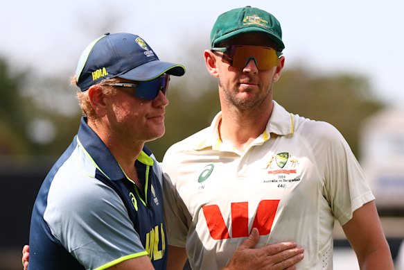 Australian coach Andrew McDonald and Josh Hazlewood.