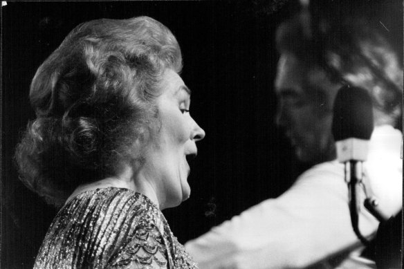 Star performer of the Opera Dame Joan Sutherland sings as her husband Richard Bonynge conducts behind her.