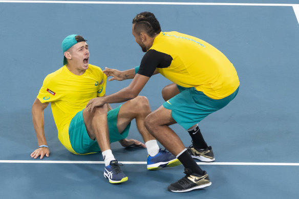Alex De Minaur and Nick Kyrgios celebrate their epic doubles win over Great Britain at Ken Rosewall Arena.
