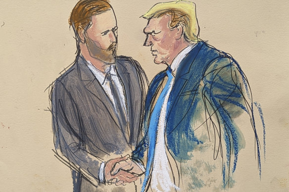 Donald Trump shook his son Eric’s hand as he walked out of the courtroom.