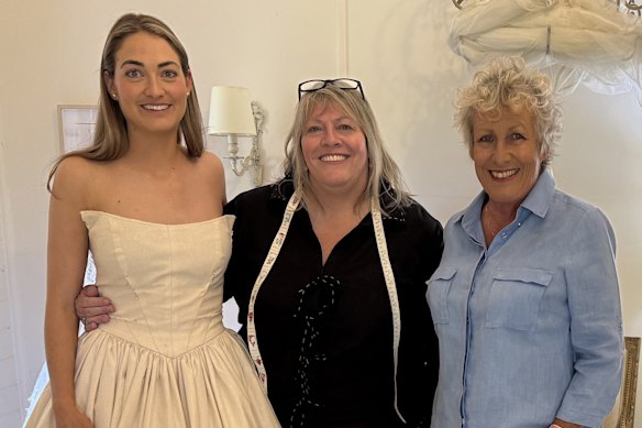 Heather Ewart (right) with Moree’s legendary wedding dressmaker  Melinda O’Donoghue and a bride-to-be. 