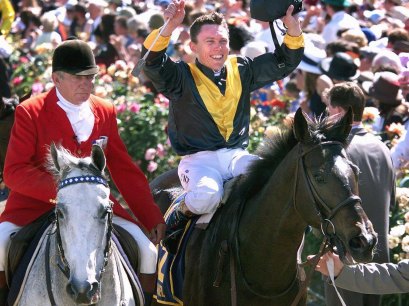 Career highlight: Chris Munce celebrates his 1998 Melbourne Cup triumph on Jezabeel.