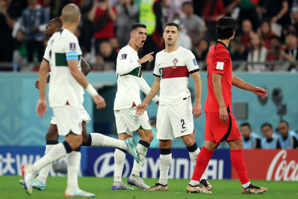 Cristiano Ronaldo of Portugal reacts towards fans during match.