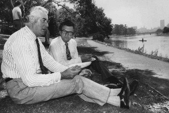 Gough Whitlam and Bob Hawke relax on the banks of the Yarra River after a rally in City Square in 1972.