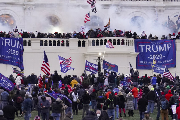 Donald Trump supporters storm the Capitol in Washington on January 6 last year. 