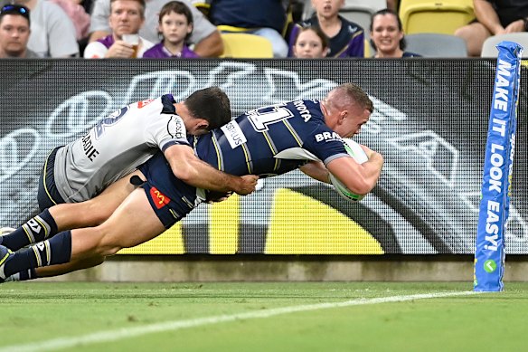 Tom Gilbert scores a stunning a solo try for the Cowboys.