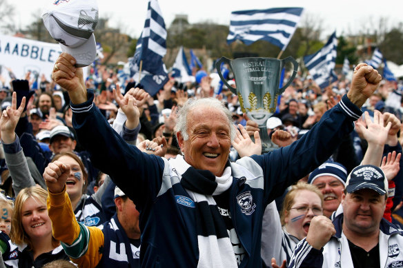 Costa celebrates with fans after the Cats’ grand final win in 2009.