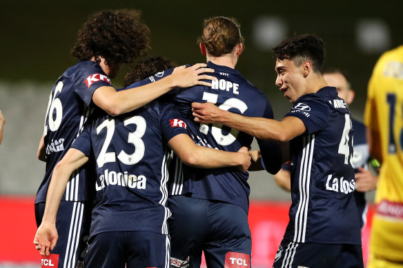 Marco Rojas (No.23) celebrates his goal for Melbourne Victory.