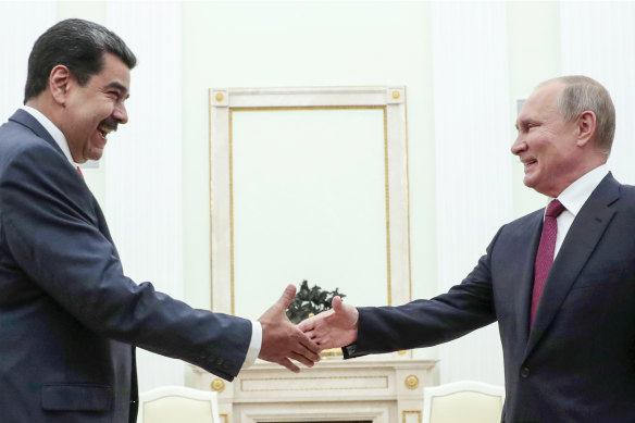Russian President Vladimir Putin, right, shakes hands with Venezuela’s Nicolas Maduro in the Kremlin in 2019. Maduro threw his support behind Putin after his invasion of Ukraine.
