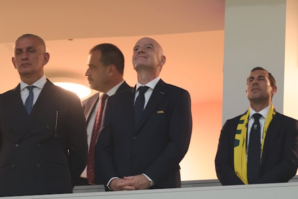 Infantino and Football Australia chairman Anter Isaac (right) at the Socceroos-Turkey match at the World Cup.