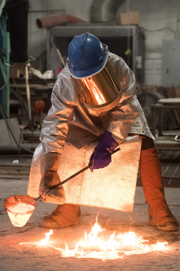 Lindy Lee working on her flung bronze works at the Foundry in Brisbane.