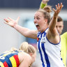 Emma King celebrates North Melbourne’s dramatic one-point win in the preliminary final against Adelaide.