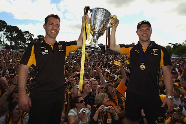 MELBOURNE, AUSTRALIA - SEPTEMBER 28:  Alastair Clarkson coach of the Hawks and Sam Mitchell the captain hold up the 2008 AFL Premiership Cup during the Hawthorn Hawks AFL Grand Final reception at Ausdoc Oval on September 28, 2008 in Melbourne, Australia.  (Photo by Mark Dadswell/Getty Images)