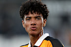 Lucas Herrington of Hull City applauds the fans.