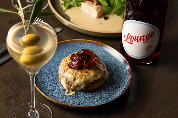 Sourdough crumpet with smoked beef, torched provolone cheese and pickled mushrooms.