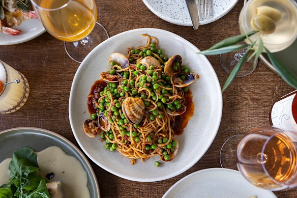 Spaghetti with venus clams and nduja.