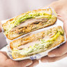 The queue-worthy Cubano sandwich from Nico’s is a masterclass in maximalism
