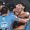 James Tedesco celebrates the match-winning try.