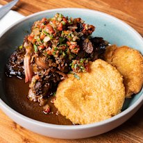 Bluestone serves its barbecue with arepas (maize flatbread)