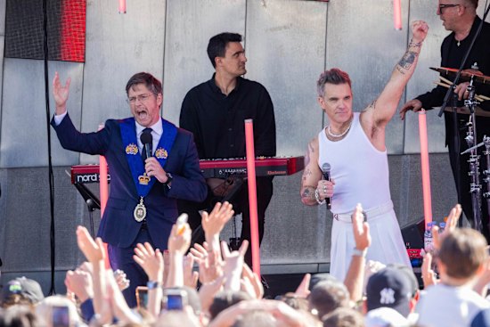 Melbourne Lord Mayor Nick Reece with Robbie Williams to give him the key to the city at Federation Square. 