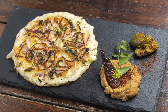 Uttapam with coconut chutney.