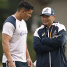 Wallabies coach Eddie Jones talks with Izzy Perese at training in Melbourne.