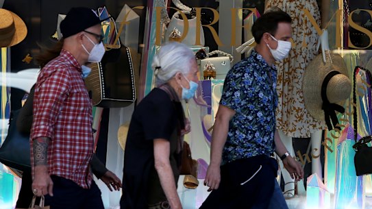 Christmas shoppers are being urged to wear masks and limit gathering sizes as omicron fuels new case numbers.