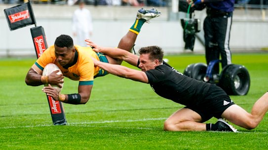 Australia's Filipo Daugunu scores a try in Wellington last month.