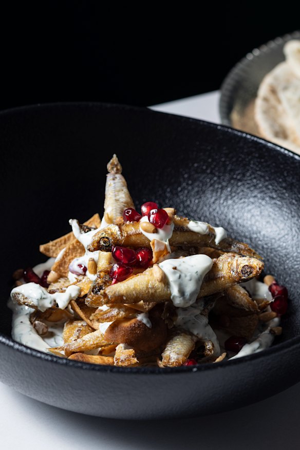 Whitebait fatteh, layered with yoghurt and crunchy pita.