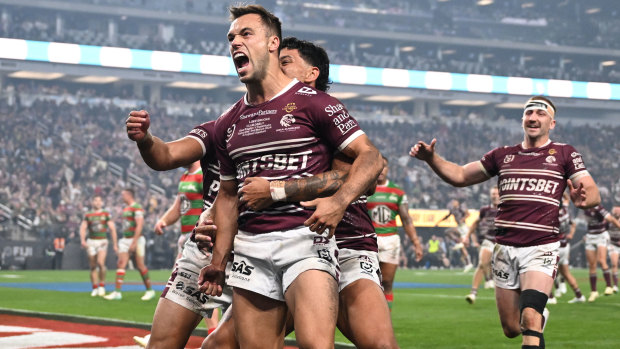 Luke Brooks and the Sea Eagles celebrate a try and victory in Las Vegas.