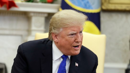 President Donald Trump meets with Senate Minority Leader Chuck Schumer, D-N.Y., and House Minority Leader Nancy Pelosi, D-Calif., in the Oval Office of the White House, Tuesday, Dec. 11, 2018, in Washington. (AP Photo/Evan Vucci)