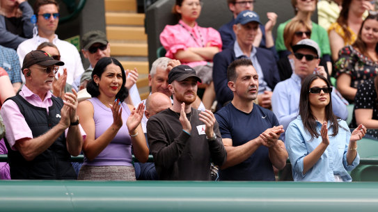 Nick Kyrgios’ team applauds during his quarter-final win.
