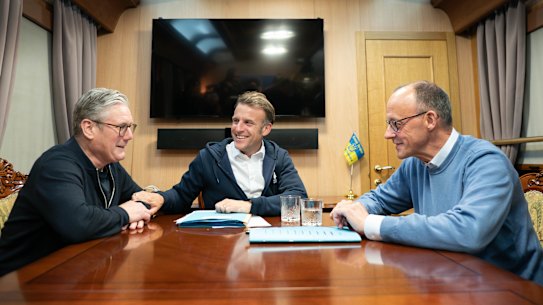 British Prime Minister Sir Keir Starmer, French President Emmanuel Macron and German Chancellor Friedrich Merz meet onboard a train en route to Kyiv.