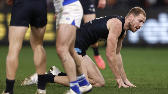 Carlton’s Harry McKay on all fours after copping a knock in the third quarter against North Melbourne.