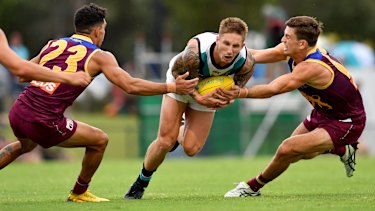 Dixon boots four as Power take care of Lions